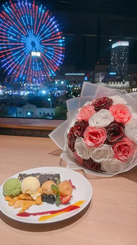 夜景と花束、甘い夜の贅沢