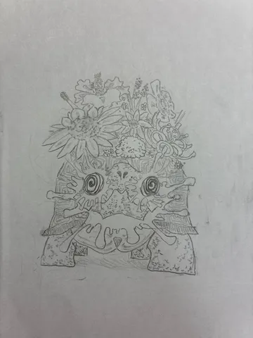 花を飾る小さな怪獣