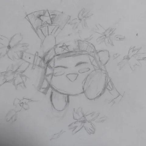 星と花に囲まれたカービィ