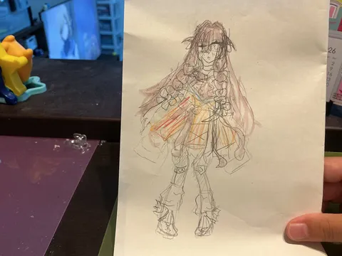 画用紙に描かれた華やかなキャラクター