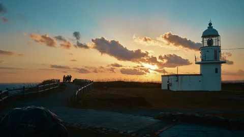 灯台と夕焼け、旅の始まり