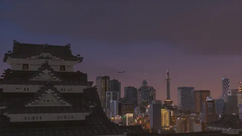 空と城が引き合う夕景