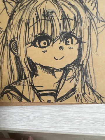 線画の少女、風に揺れる髪