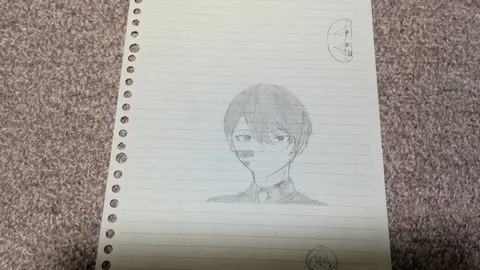 ノートに描いたクールな表情