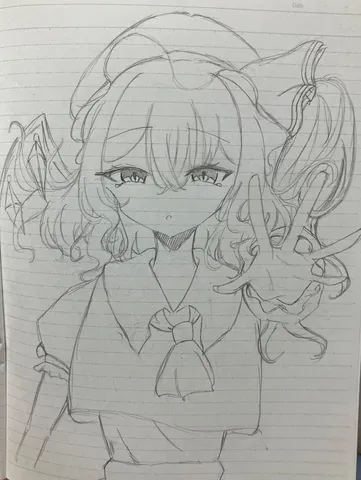 ノートに描かれた少女のスケッチ