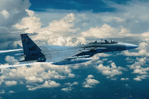 飛行機雲を引く戦闘機
