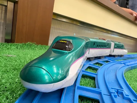 緑の疾走、玩具の旅
