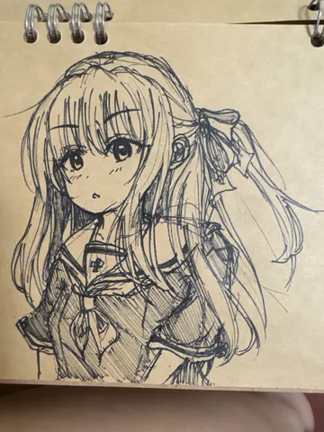 ノートに描かれた少女の横顔