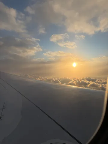 翼越しの夕景と雲海