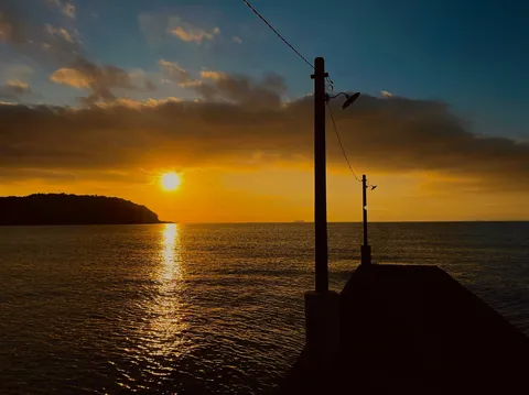 水面に綴る夕日の詩