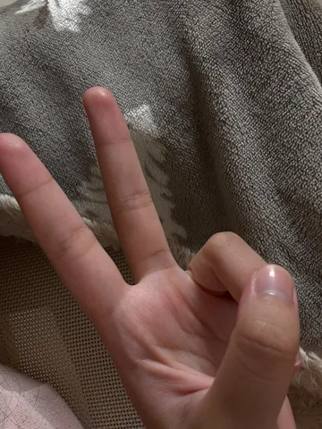 指と布の静かな対話