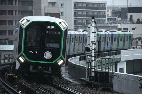 雨粒と都会の疾走感