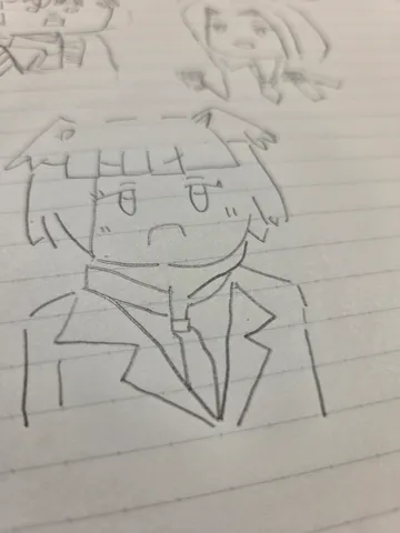 ノートに描かれたクールな表情
