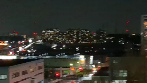 光の残像、都市の夜景