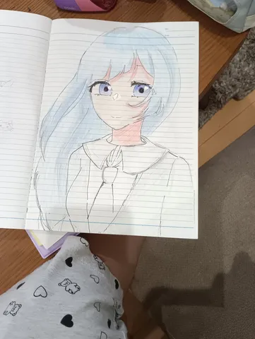 ノートに描かれた儚げな少女