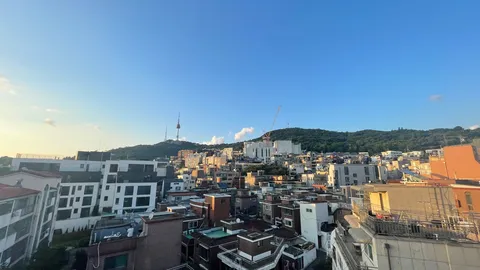 山と都市がつなぐ夕景