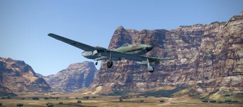 雄大な岩山と空を舞う機体