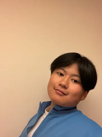 青いジャンパーのポートレート