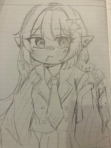 ノートに描かれた少女のスケッチ