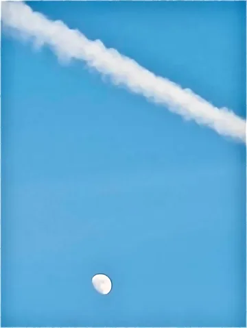 青空に浮かぶ白い線と月