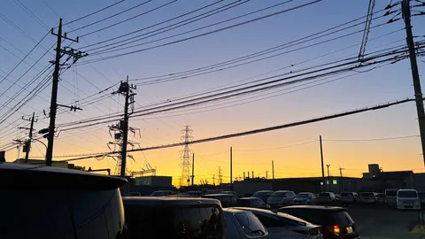 送電線と夕焼けのコラボレーション