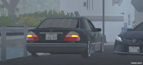 霧雨のハイウェイ、往く車