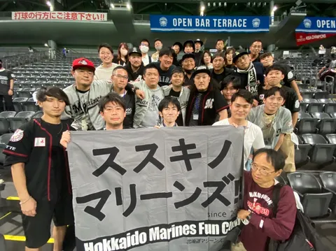 仲間と掴んだ勝利の旗