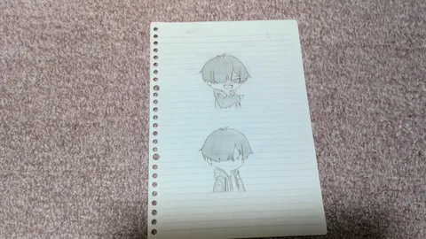 ノートに描かれた二つの表情