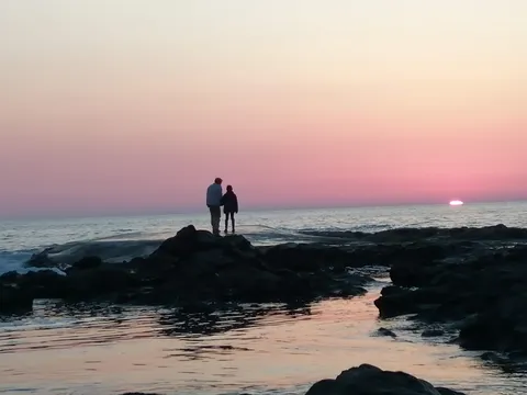 ピンクに染まる海の刻