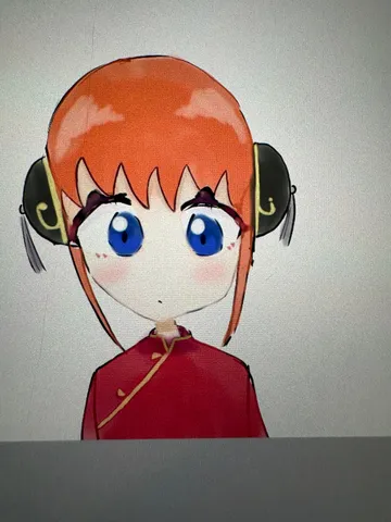 赤髪と青い瞳の静かな表情