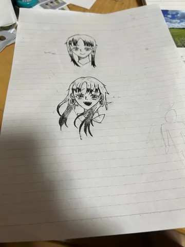 鉛筆で描かれた二つの顔