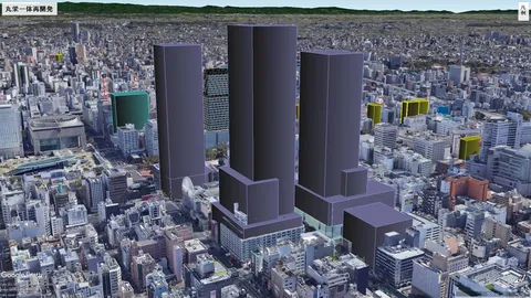 高層の影が街を染める