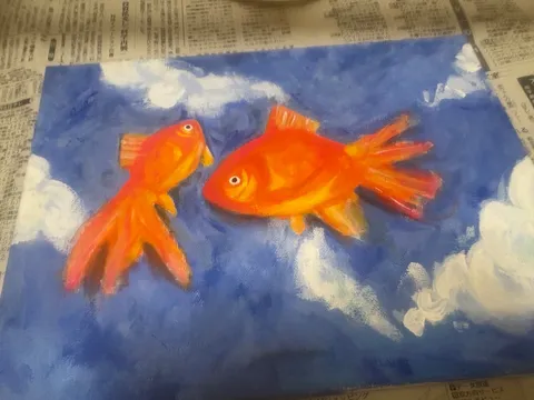 青空を泳ぐ金魚たち