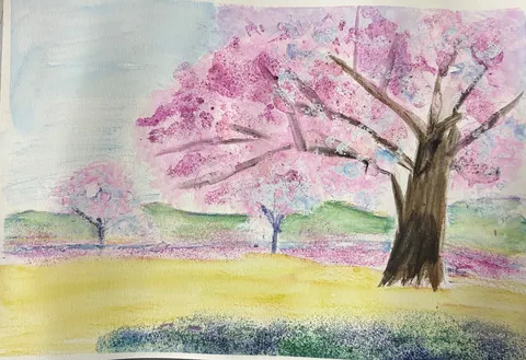 春風に揺れる桜の下