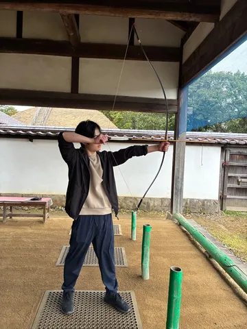 空間を引く弓の一瞬