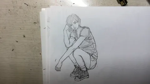 鉛筆で描かれた、物憂げなポーズの少年