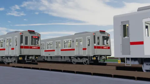 並走する銀色列車