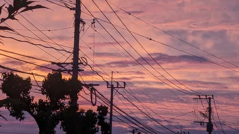 電線と夕焼けのコントラスト