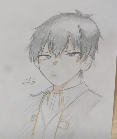 なんとも言えない表情の少年