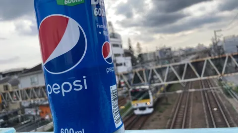 ペプシと並走する電車