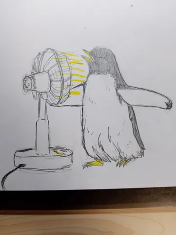 ペンギン、扇風機に夢中