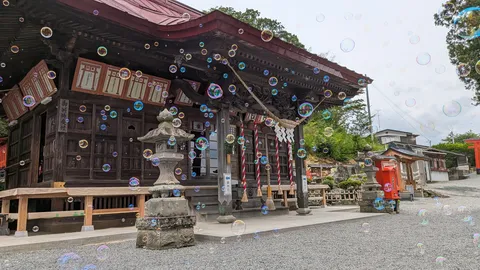 風に揺れる祈りの泡