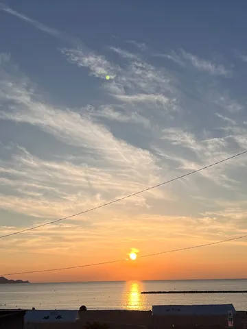 夕陽に染まる水平線