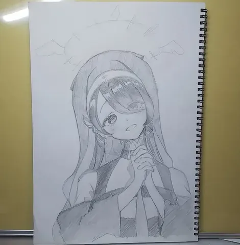 祈りを捧げる聖女の肖像