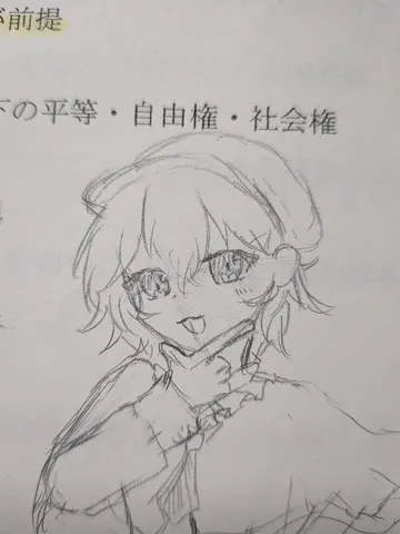 ノートに描かれた少女の落書き