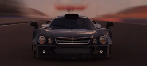 夕焼けを駆ける漆黒の車