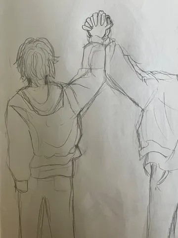 ハイタッチする少年たちの瞬間