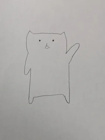 紙の上の小さな猫