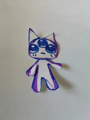 不思議な目をした猫ちゃんの切り絵