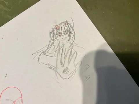 悪魔っ子、筆を走らせる